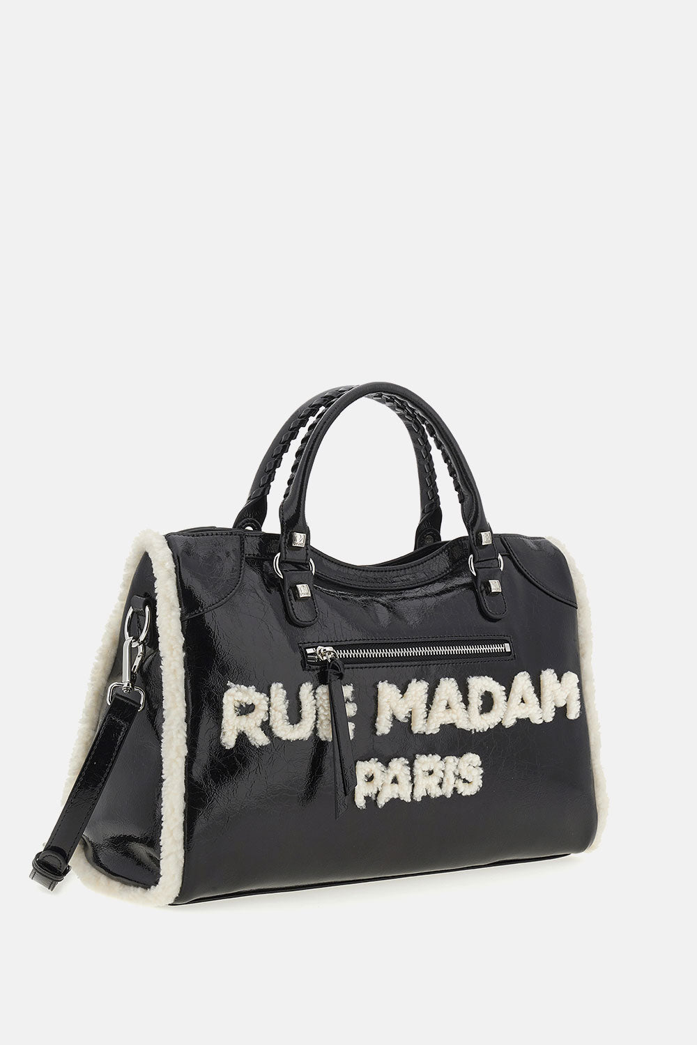 Dettaglio del logo e dei profili in eco-montone della Shine Tote.