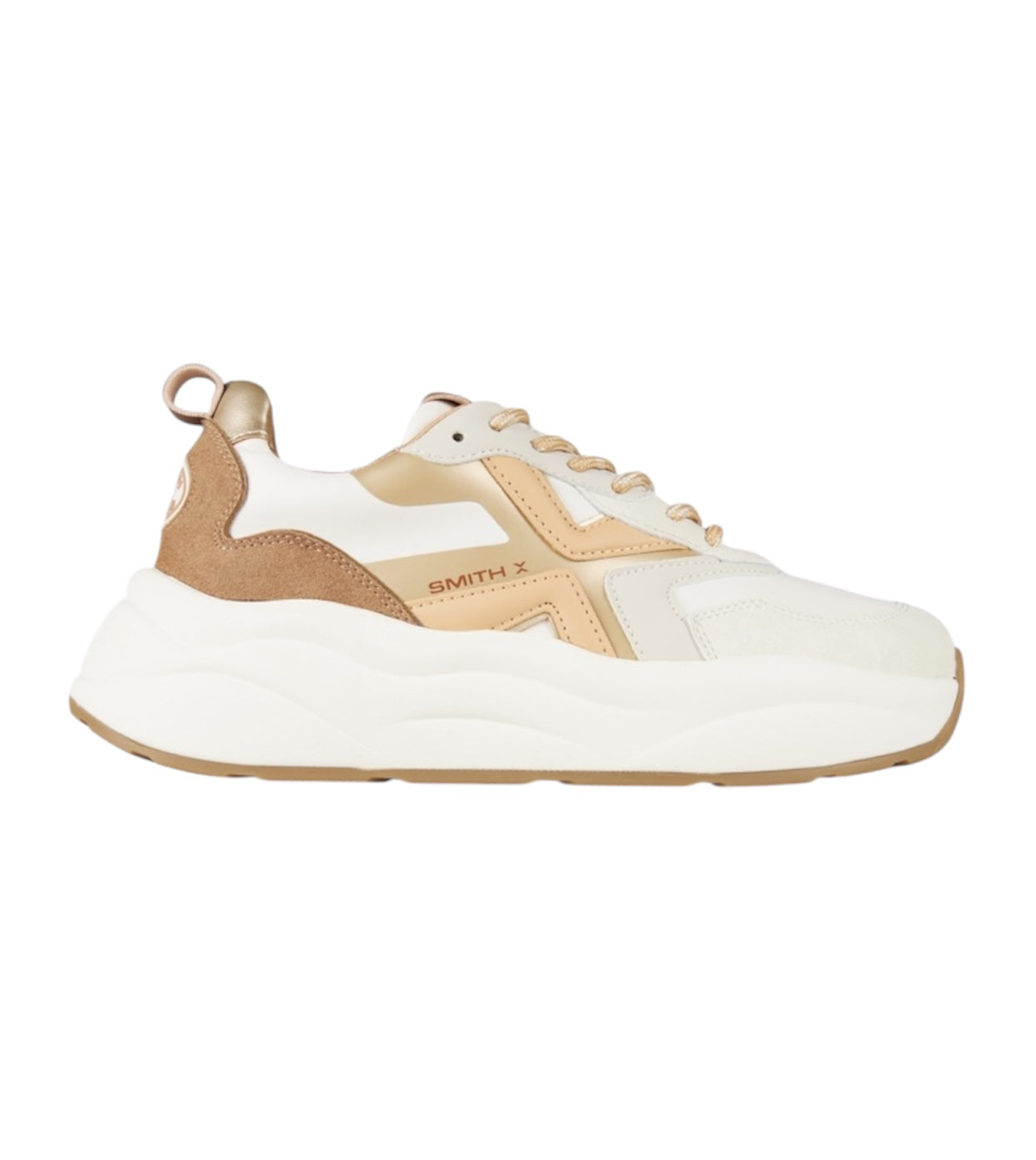 Vista laterale della sneaker Horizon bianca con inserti suede marrone.
