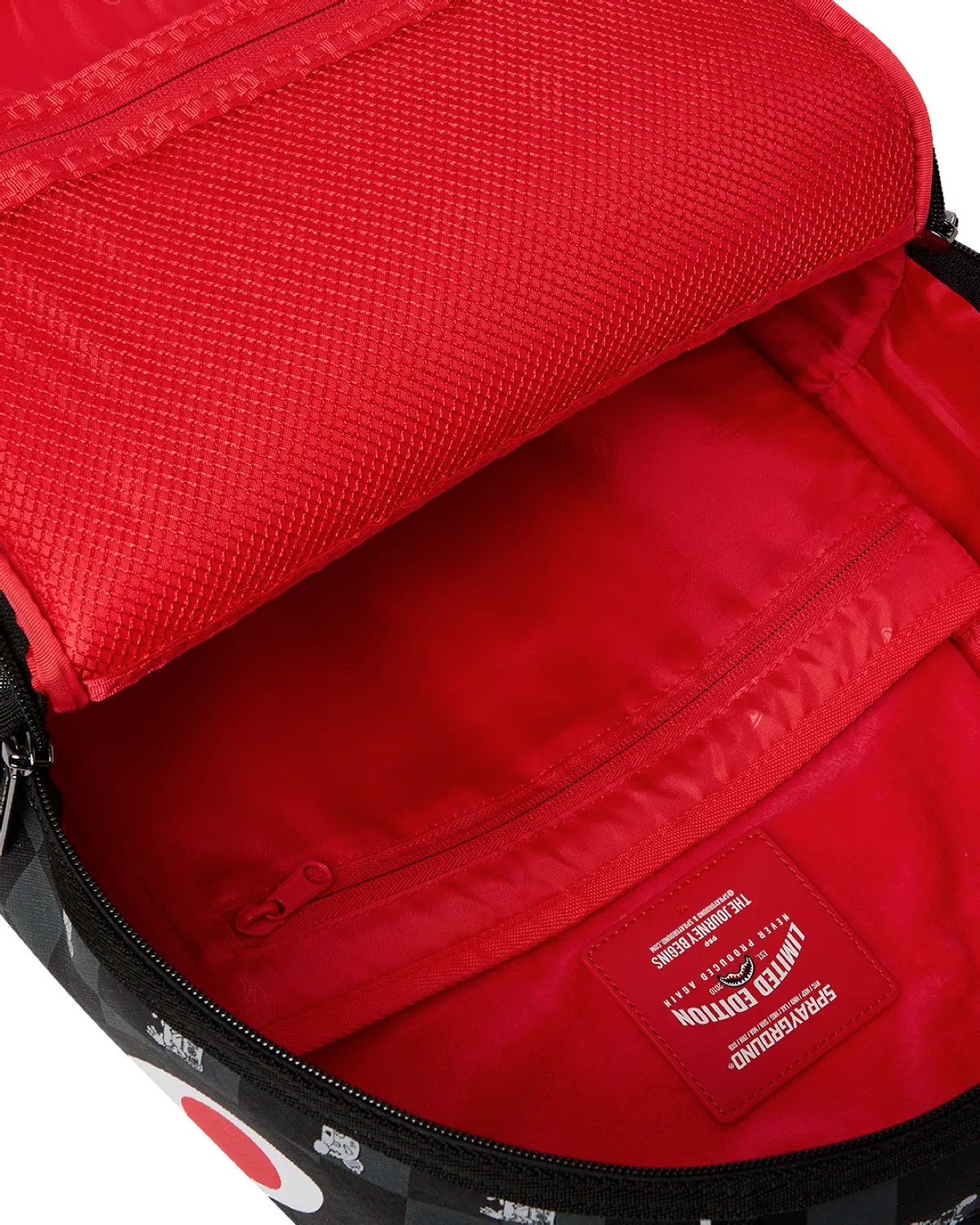 Interno con scomparto laptop e tasche organizzative.
